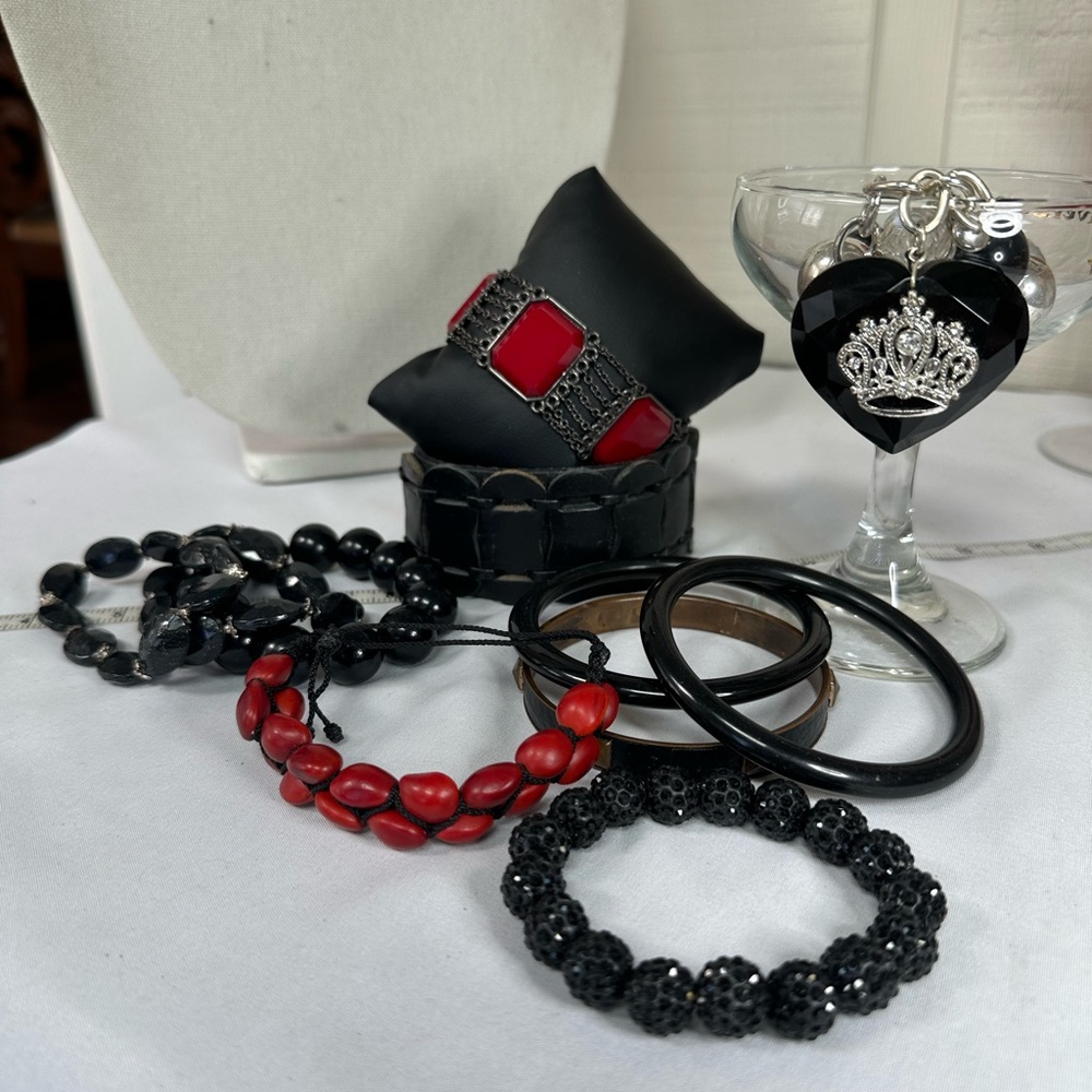 Group of 11 black and red bracelets
